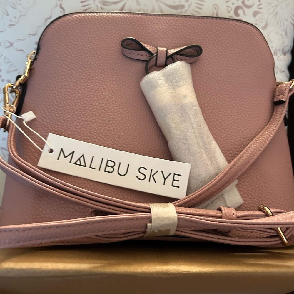 3 Crossbody purses. Brand new, never been used.